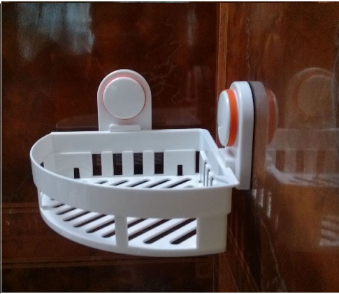 suction cup bathroom shelf in corner