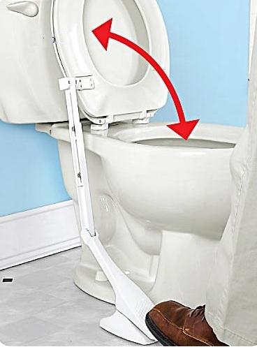 Pedal operated toilet seat lifter